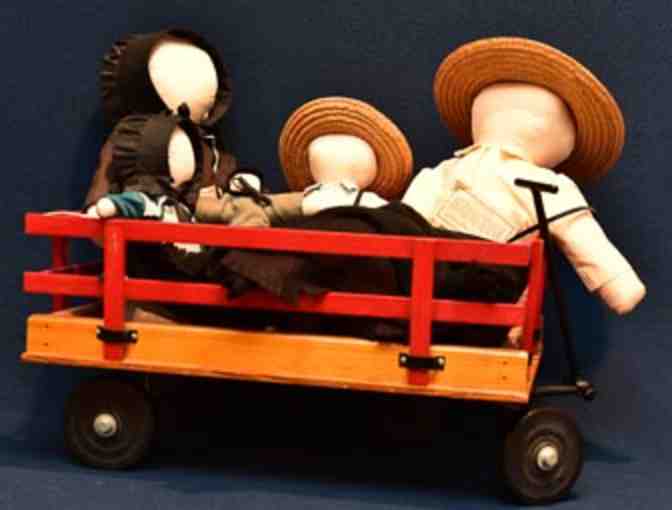 Collectible: Amish dolls, clothes and a wagon
