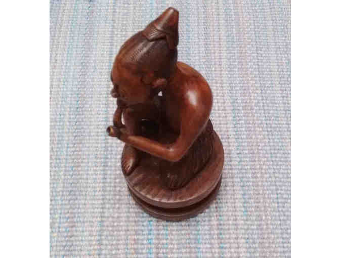 Hand-carved African wooden figurine