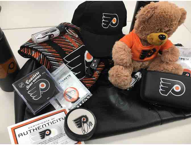 4 tickets to Philadelphia Flyers with exclusive Locker Room Lounge experience on April 7th
