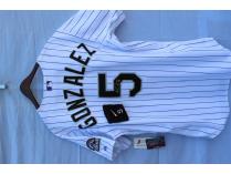 Carlos Gonzalez signed jersey and game worn wrist band