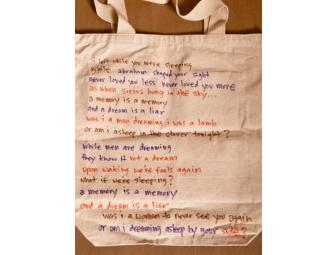 Jenny Lewis of Rilo Kiley wrote a poem on the back of her 'Hot Damn' Tote Bags