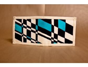 The Strokes one-of-a-kind wallet, decorated and signed by all members