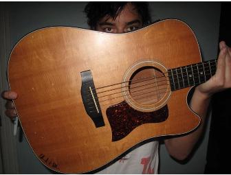 Ed Droste of Grizzly Bear signed Taylor guitar he learned to play on and used fr recording