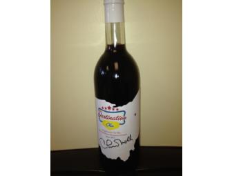 Autographed wine bottle by Coach Chuck Noll