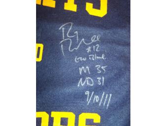 Denard Robinson and Roy Roundtree autographed 'Under the Lights' Banner