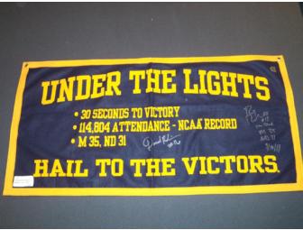 Denard Robinson and Roy Roundtree autographed 'Under the Lights' Banner