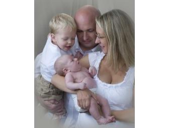 A studio or location Family Session and a 16' x 20' Portrait