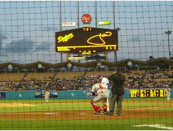 - Dodgers vs. Miami Marlins- Four VIP Dugout Club Tickets for 5/12/14 game