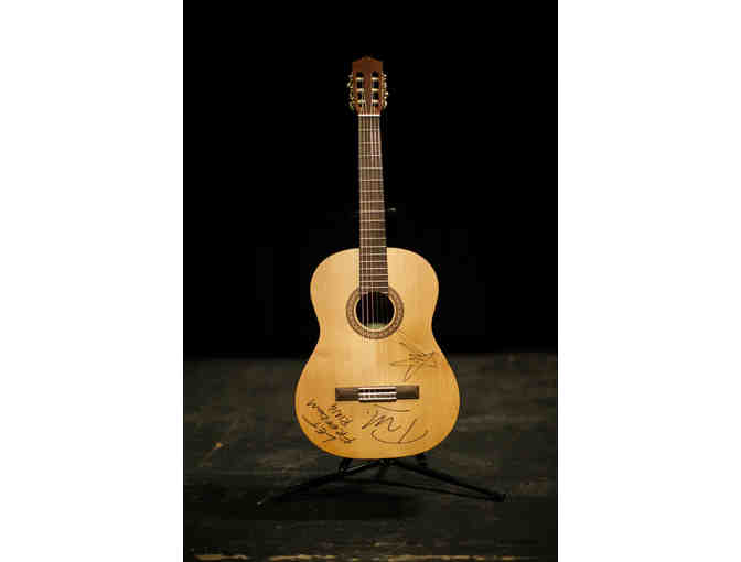 Guitar signed by Chris Cornell and Tom Morello from 15 Now Benefit Concert
