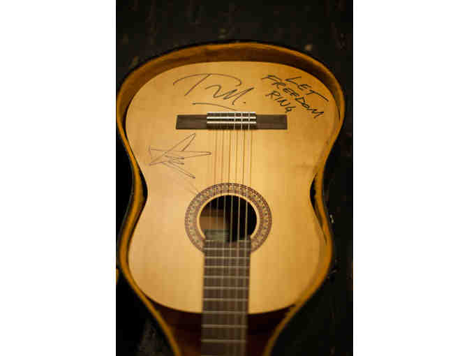 Guitar signed by Chris Cornell and Tom Morello from 15 Now Benefit Concert