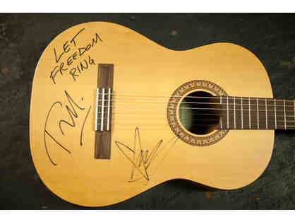 Guitar signed by Chris Cornell and Tom Morello from 15 Now Benefit Concert