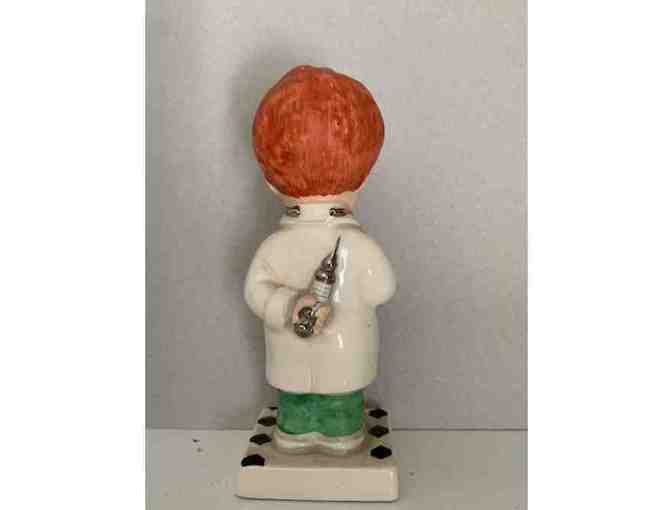Red Head Doctor Figurine