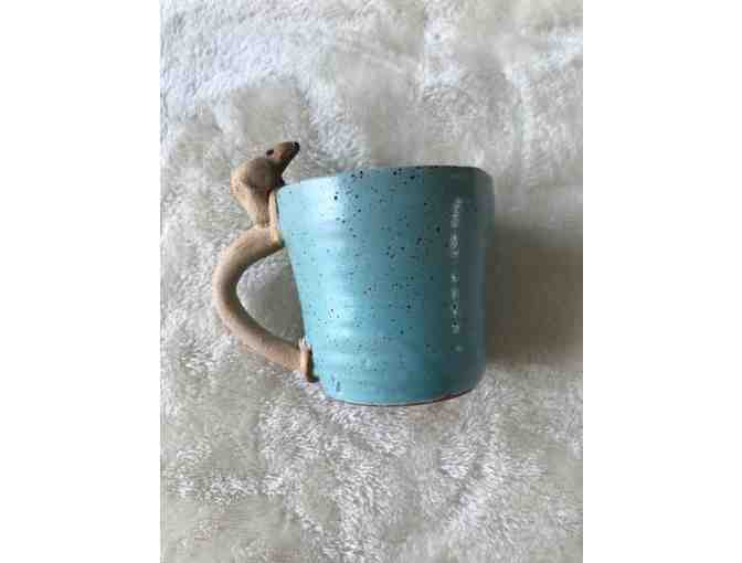 Handmade pottery coffee mug with dachshund handle