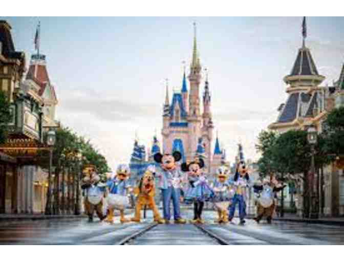 A Family Trip For Four to Disney World in Orlando, FL.