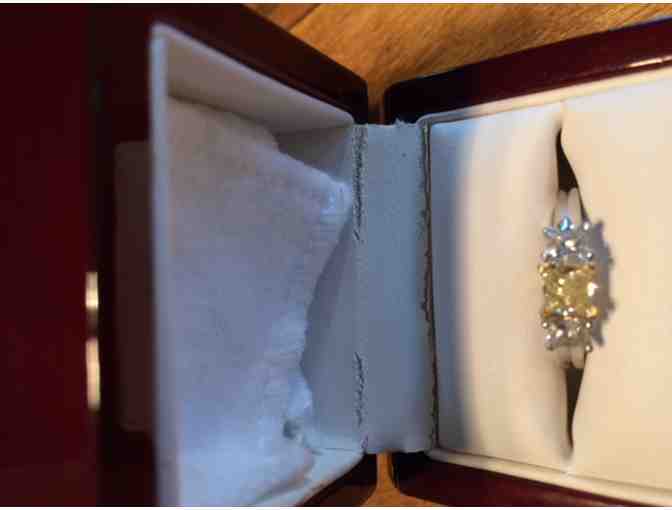 Platinum and 18 karat gold yellow diamond ring