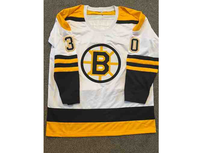 Gerry Cheevers Boston Bruins Autographed White Jersey Inscribed 'HOF 85'