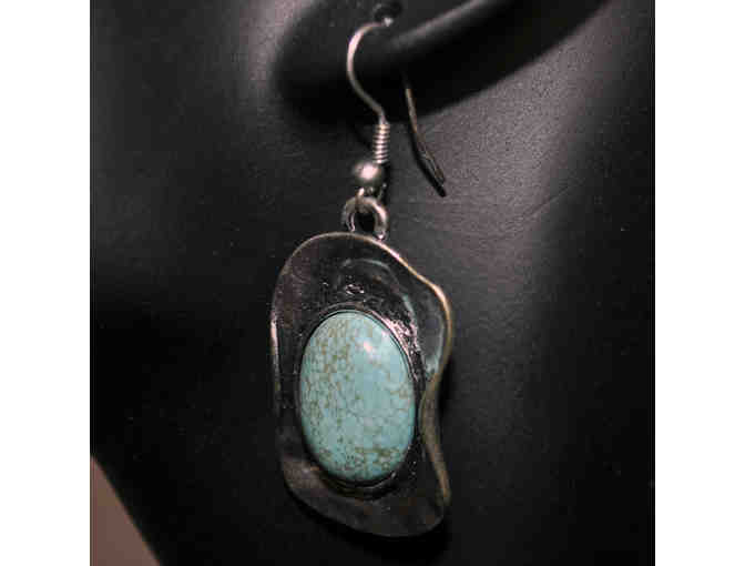 Turquoise Colored Stones Set in Bent Silver Oval Earrings