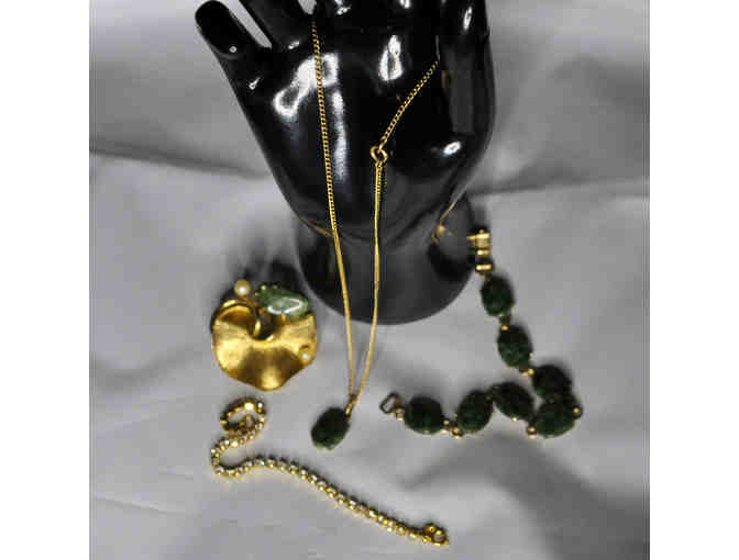 Necklace and Bracelet With Jade Colored Stones, Tennis-Style Bracelet, and Gold Flower Pin