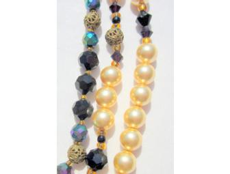 TRIPLE STRAND ONE OF A KIND PEARL/ONYX NECKLACE