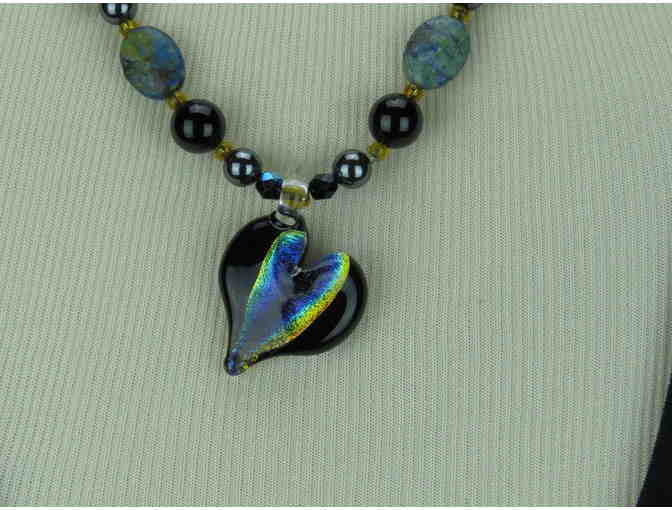 1/KIND Whimsical Necklace features Genuine Black Onyx and Porcelain Accents!