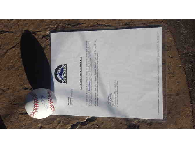 Lot 106 is a Colorado Rockies Trevor Story Autographed Baseball