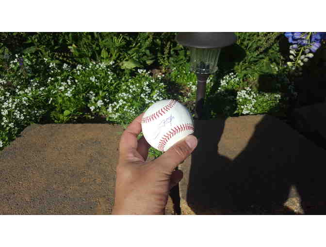 Lot 106 is a Colorado Rockies Trevor Story Autographed Baseball