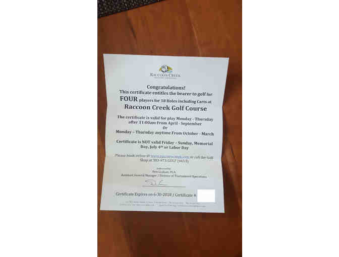 Raccoon Creek Golf Course foursome with carts