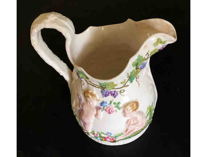 Antique decorative pitcher