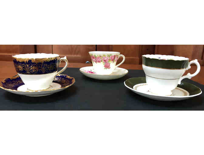 Set of three English tea cups and saucers