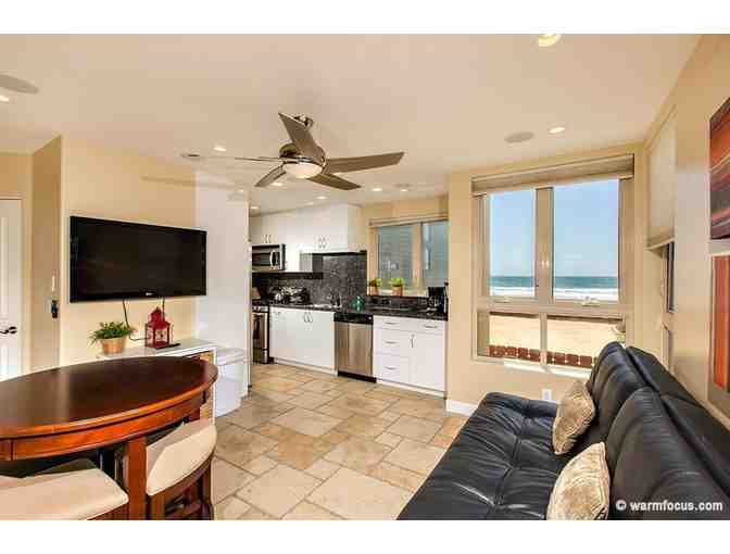 3 Night Stay at Mission Beach and Airfare for Two