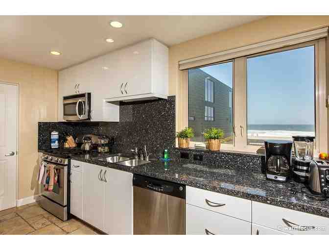 3 Night Stay at Mission Beach and Airfare for Two