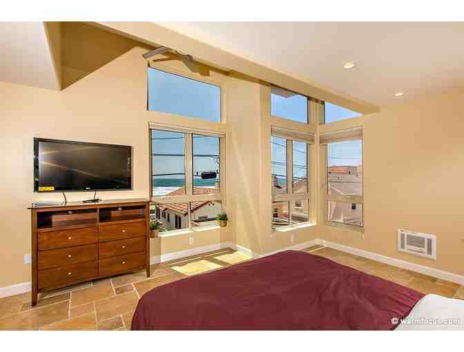 3 Night Stay at Mission Beach and Airfare for Two