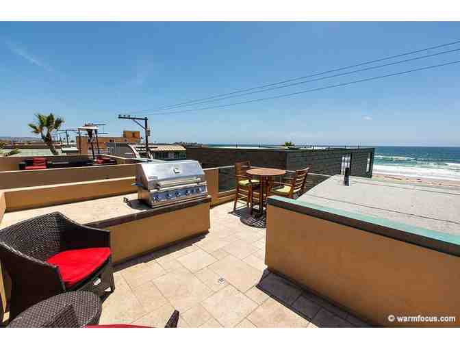 3 Night Stay at Mission Beach and Airfare for Two