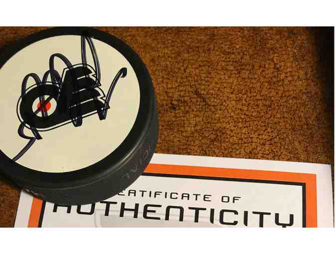 The Philadelphia Flyers - Autographed  Hockey Puck with Certificate of Authenticity