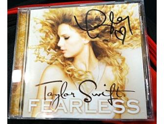 Taylor Swift package 2 -- deluxe backpack & autographed CD