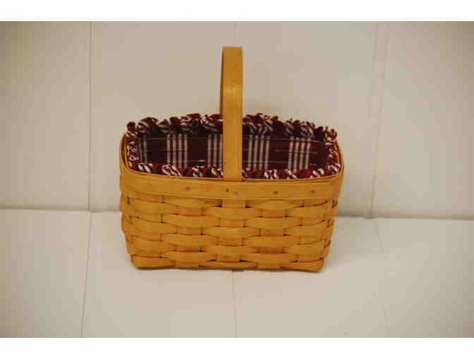 Small Longaberger basket with handle and red liner
