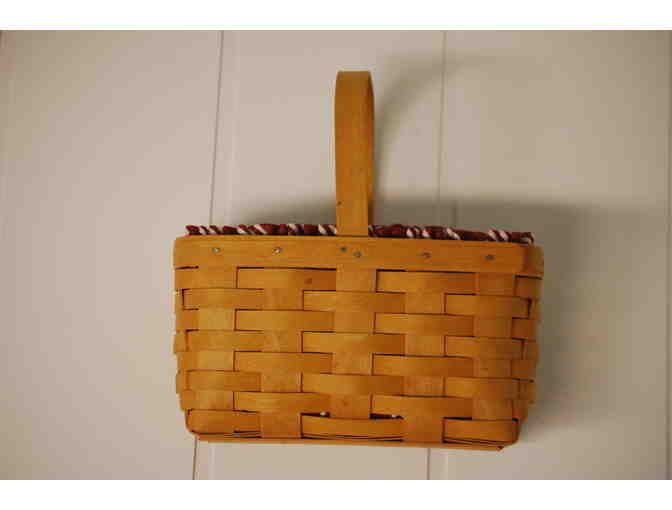 Small Longaberger basket with handle and red liner