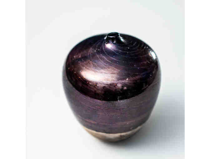 Decorative burnished vase with glazed top