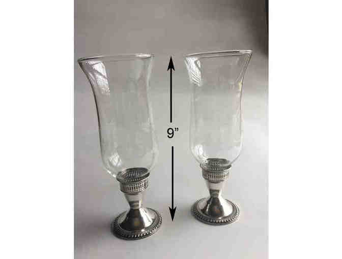 One pair of Duchin Sterling candlesticks