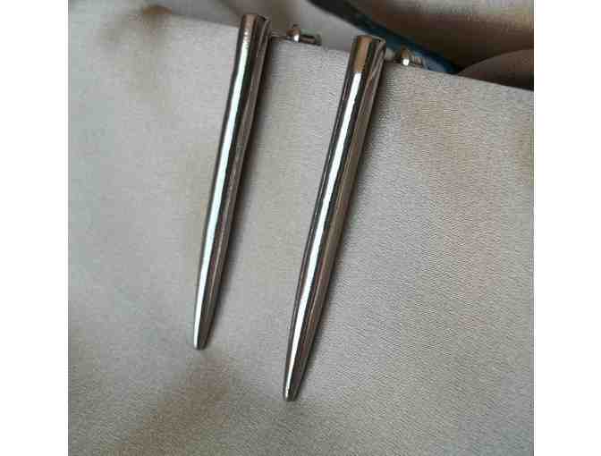 Silver colored stake earrings