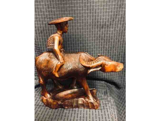 Man Riding Water Buffalo wood statue from the Philippines