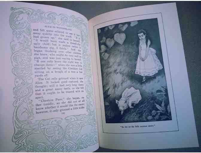 Alice's Adventures in Wonderland and Through the Looking Glass by Lewis Carroll