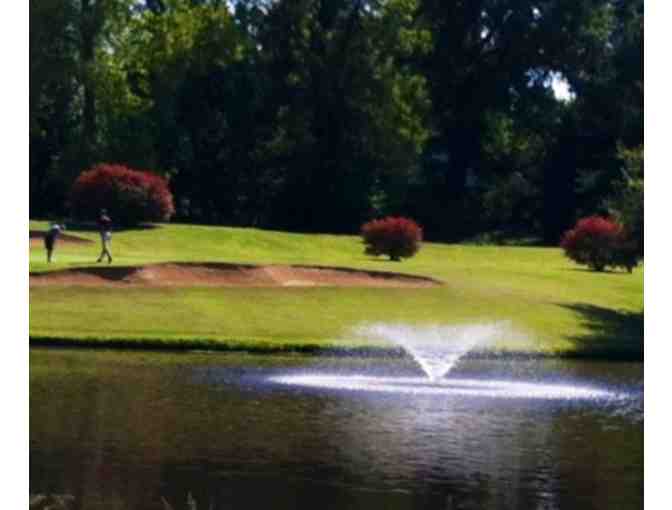 A foursome of golf with carts, lunch and non-alcoholic beverage at Henderson Country Club.