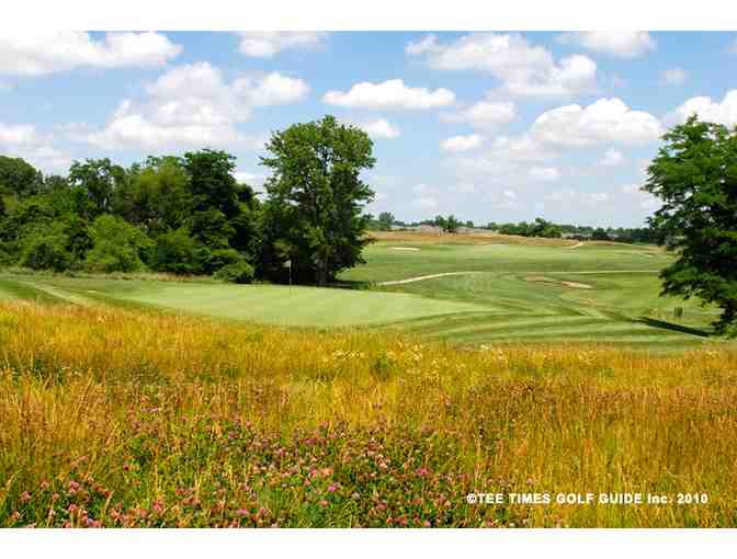 One foursome with carts at Drumm Farm Golf Club in Independence, MO.