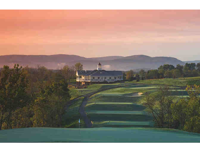 One foursome with carts at Blue Ridge Shadows Resort and Golf Club in Front Royal, VA.
