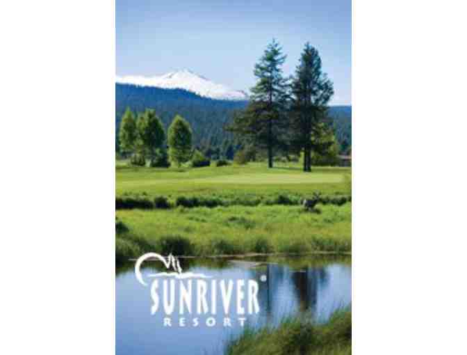 One foursome with carts at Crosswater Golf Course in Sunriver, OR.