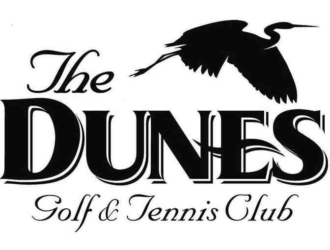 A foursome at The Dunes Golf and Tennis Club in Florida.