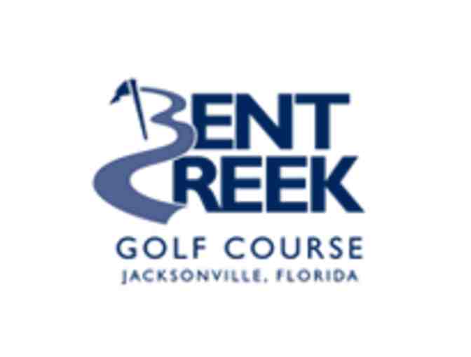 A foursome with carts at Bent Creek Golf Course in FL.