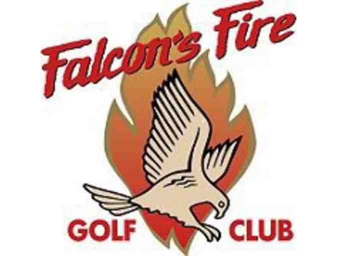 One foursome with cart at Falcon's Fire Golf Club in Kissimmee, FL.