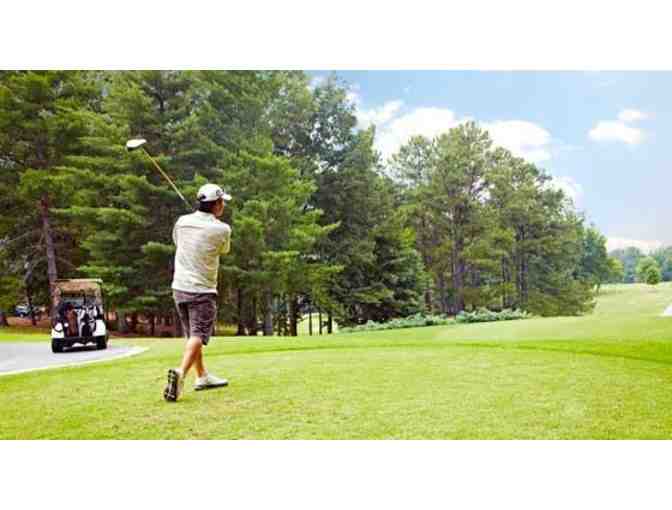 Northwood Golf and Country Club - A foursome with carts